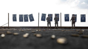 USS MAKIN ISLAND, Gulf of Aden (Jan. 19, 2017) U.S Marines with Combat Logistics Detachment 111, Combat Logistics Battalion 11, 11th Marine Expeditionary Unit, straiten tilted targets during a live-fire range or “deck shoot” aboard the USS Makin Island (LHD 8), Jan. 19. The range allowed the Marines to practice their marksmanship skills while deployed aboard the USS Makin Island. (ph U.S. Marine Corps/ Cpl. April L. Price)