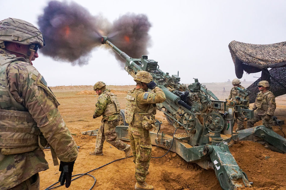 U.S. Army troopers assigned to the Field Artillery Squadron, 3rd Cavalry Regiment, fire their M777 Howitzer on Firebase Saham, Iraq, Dec. 3, 2018. They are deployed in support of Operation Inherent Resolve, working by, with and through the Iraqi Security Forces and Coalition partners to defeat ISIS in designated areas of Iraq and Syria. (U.S. Army photo by Capt. Jason Welch)