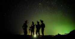 U.S. Army Soldiers from Easy Company, 101st Airborne Division (Air Assault), stand by for their night guard shift in Kenya, Jan. 20, 2020. Soldiers from the 101st Airborne Division are assigned to the East Africa Response Force and provide the ability to rapidly respond to events spanning a vast area of responsibility. (U.S. Air Force photo by Staff Sgt. Shawn White)