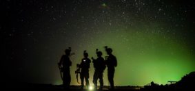 U.S. Army Soldiers from Easy Company, 101st Airborne Division (Air Assault), stand by for their night guard shift in Kenya, Jan. 20, 2020. Soldiers from the 101st Airborne Division are assigned to the East Africa Response Force and provide the ability to rapidly respond to events spanning a vast area of responsibility. (U.S. Air Force photo by Staff Sgt. Shawn White)